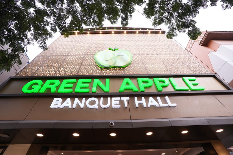 Green Apple sign in daylight