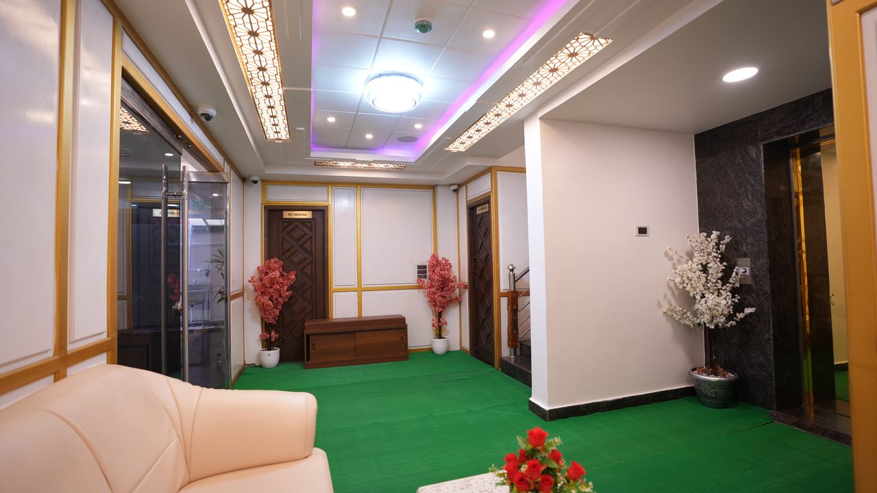 VIP lounge with sofas and fresh flowers